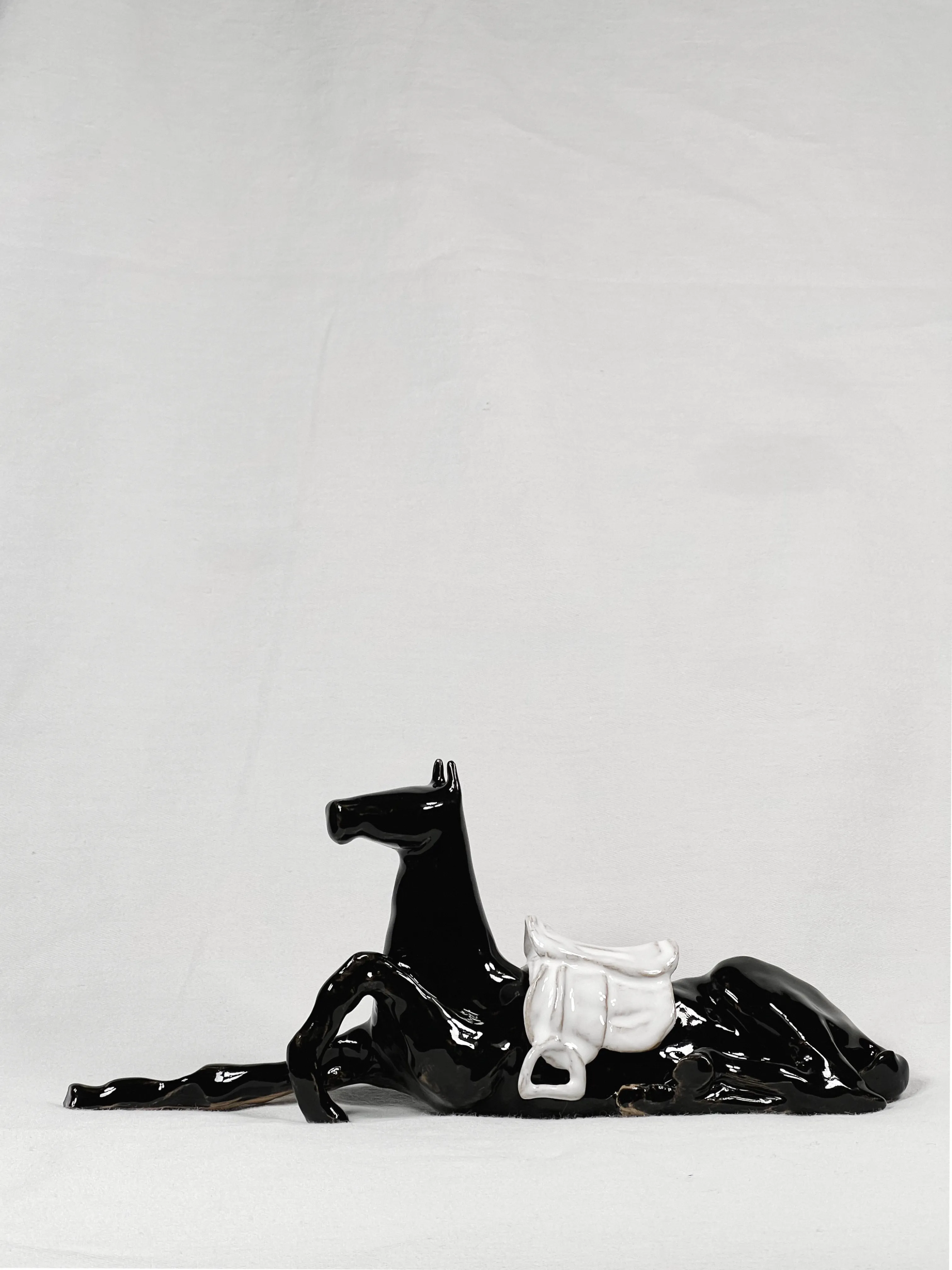 Image of “Tamed/Untamed horse”  by ANNA VERIKI, size: 27x12x9 cm , made of Ceramic , Sculpture medium, from Kyiv, Ukraine, priced at €700 Photo 1 of 11.