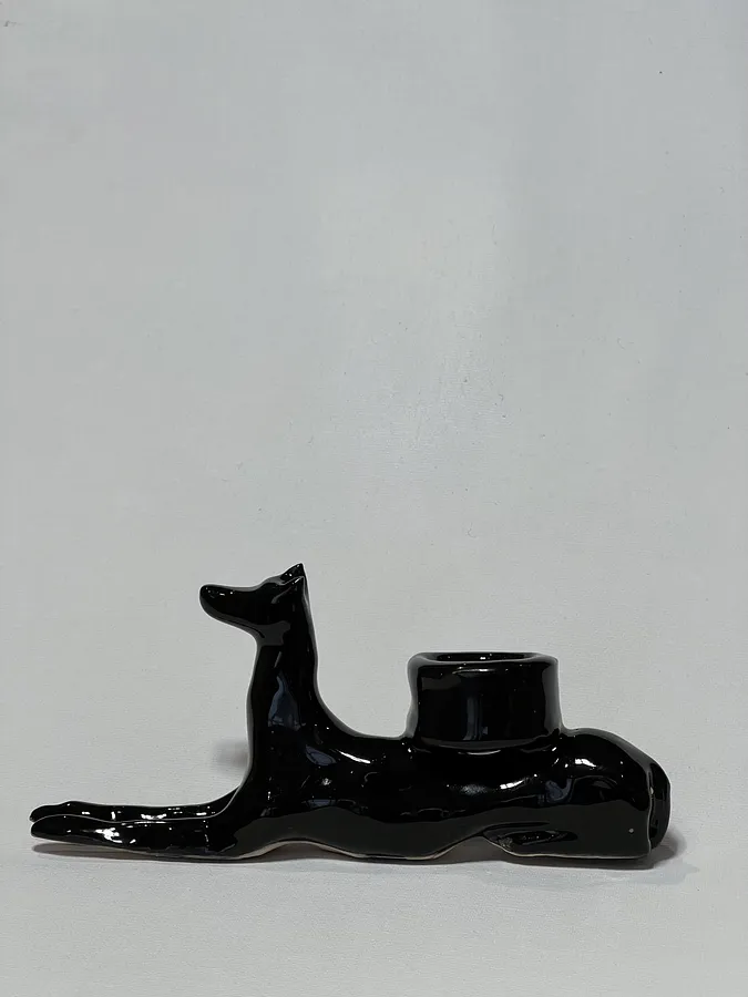 Image of “Dark dog that brings light”  by ANNA VERIKI, size: 18x6x10 cm, made of Ceramics , Sculpture medium, from Kyiv Ukraine , priced at €600