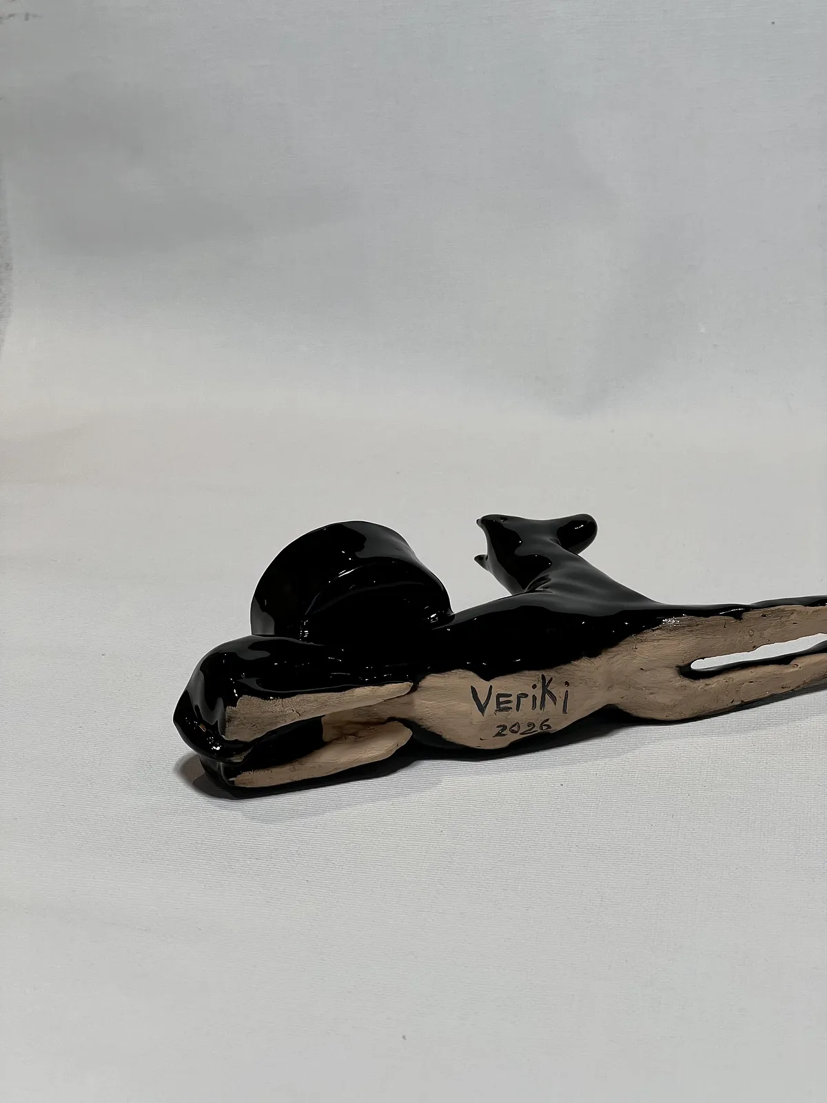 Image of “Dark dog that brings light”  by ANNA VERIKI, size: 18x6x10 cm, made of Ceramics , Sculpture medium, from Kyiv Ukraine , priced at €600 Photo 5 of 6.