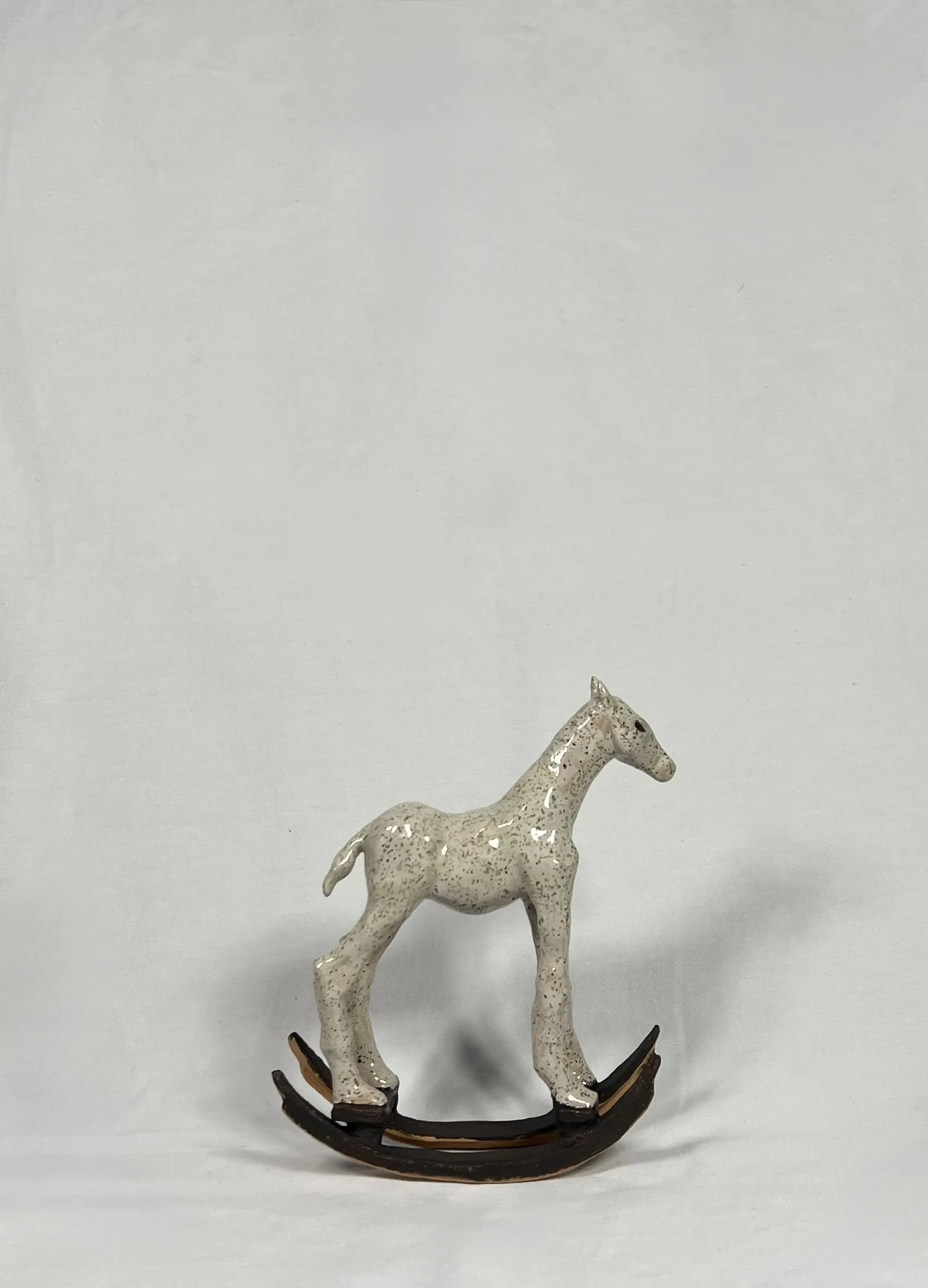 Image of “Poppy Grasshopper” by ANNA VERIKI, size: 13x5 cm, made of Ceramic , Sculpture medium, from Kyiv , priced at €500 Photo 1 of 8.